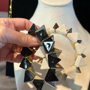 #20 Lot Of Two Spike Flex, Bracelets, Gold Tone, White, And Black